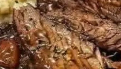 Slow-Cooked Pot Roast with Silky Gravy and Fluffy Mashed Potatoes